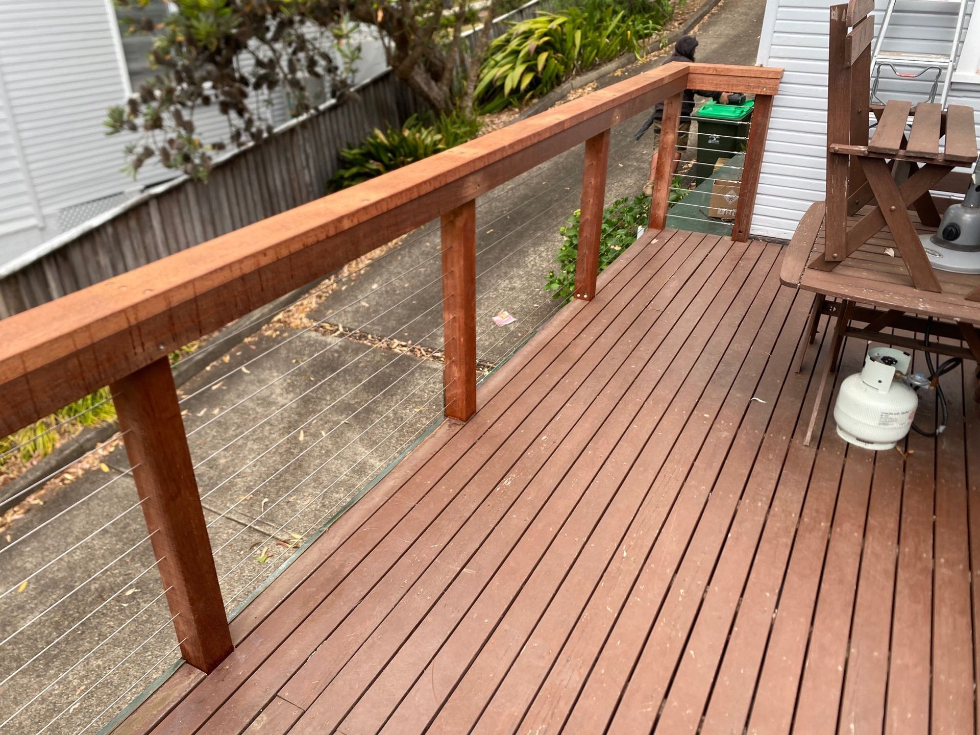 Wooden Deck With Railing Beside a Narrow Garden Path — Lakecrest Projects in Belmont North, NSW