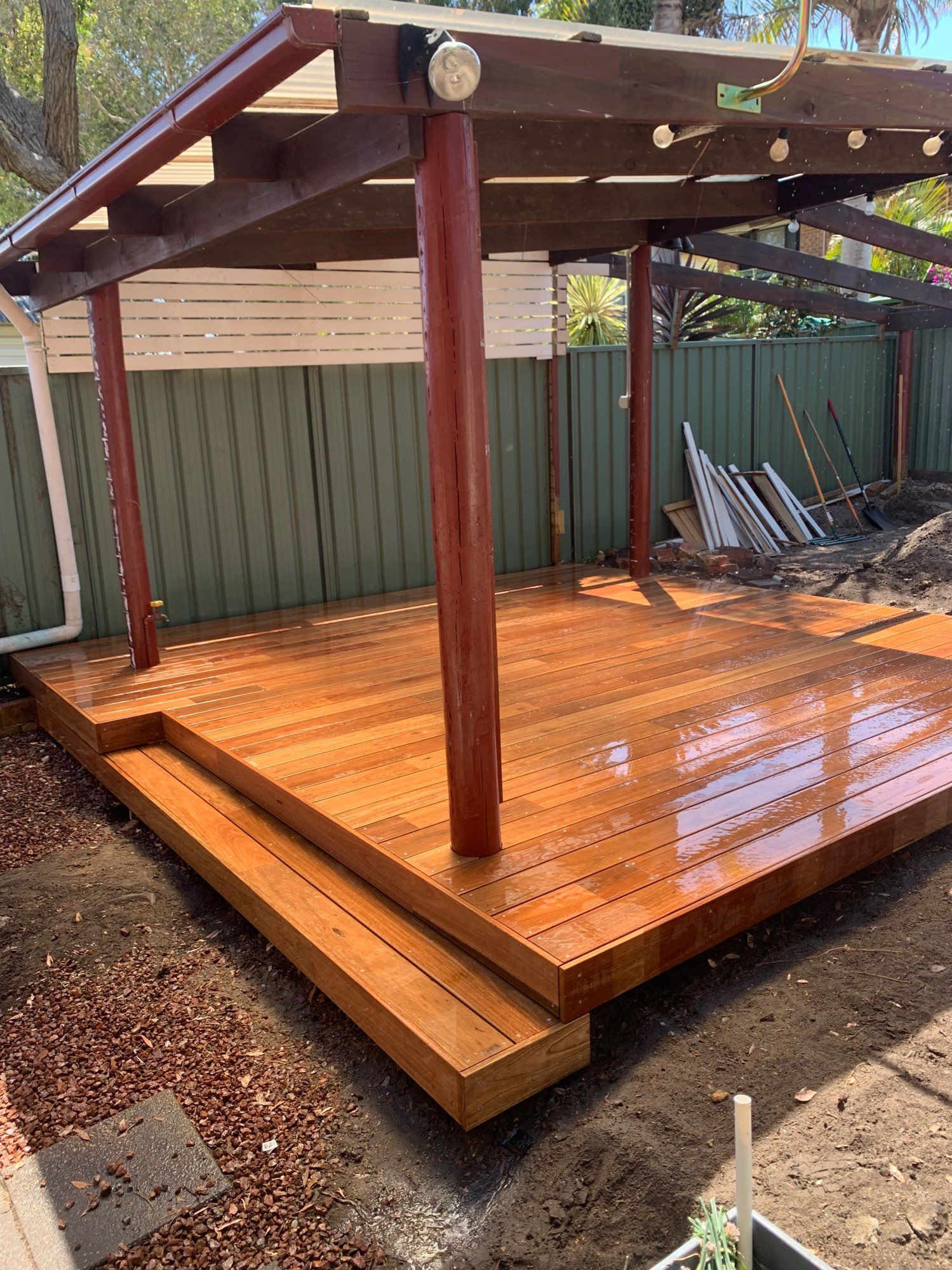 Wooden Backyard Deck With a Roofed Pergola — Lakecrest Projects in Belmont North, NSW