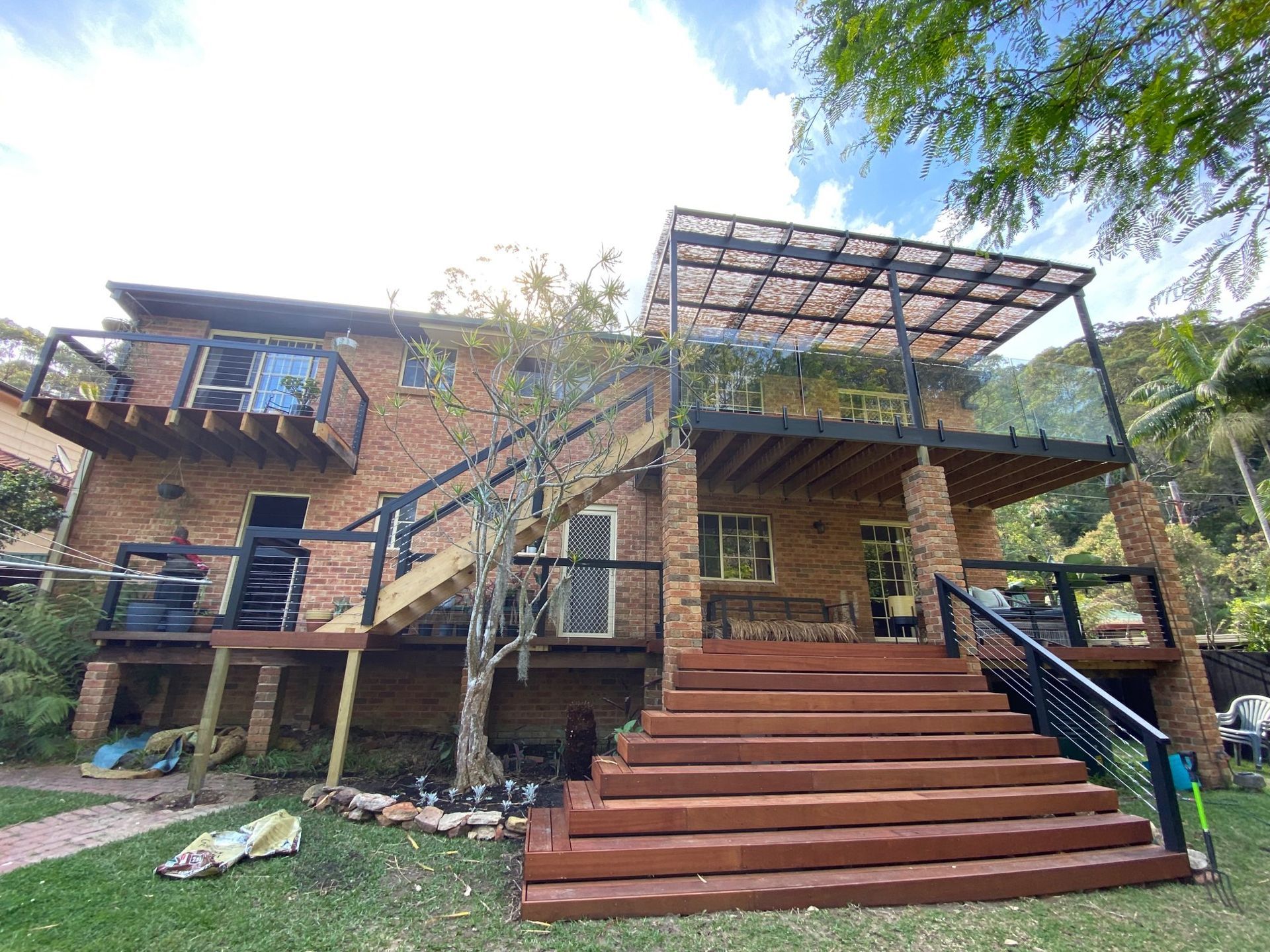 Brick House With Red Steps — Lakecrest Projects in Belmont North, NSW