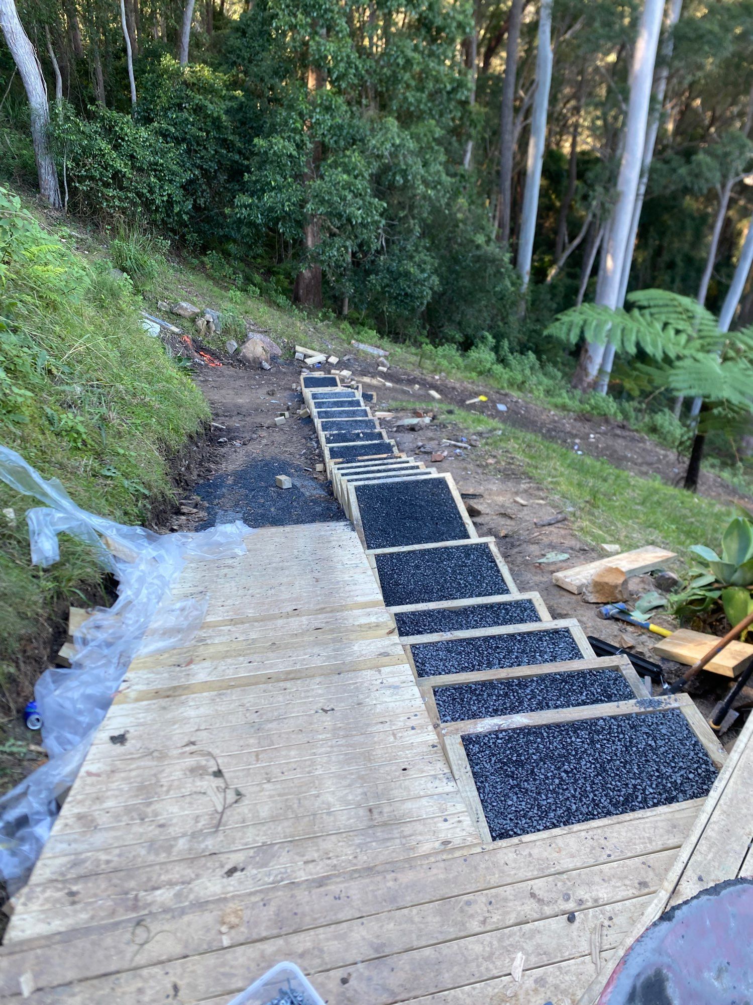 Steep Concrete Walkway With Black Gravel Drainage — Lakecrest Projects in Belmont North, NSW