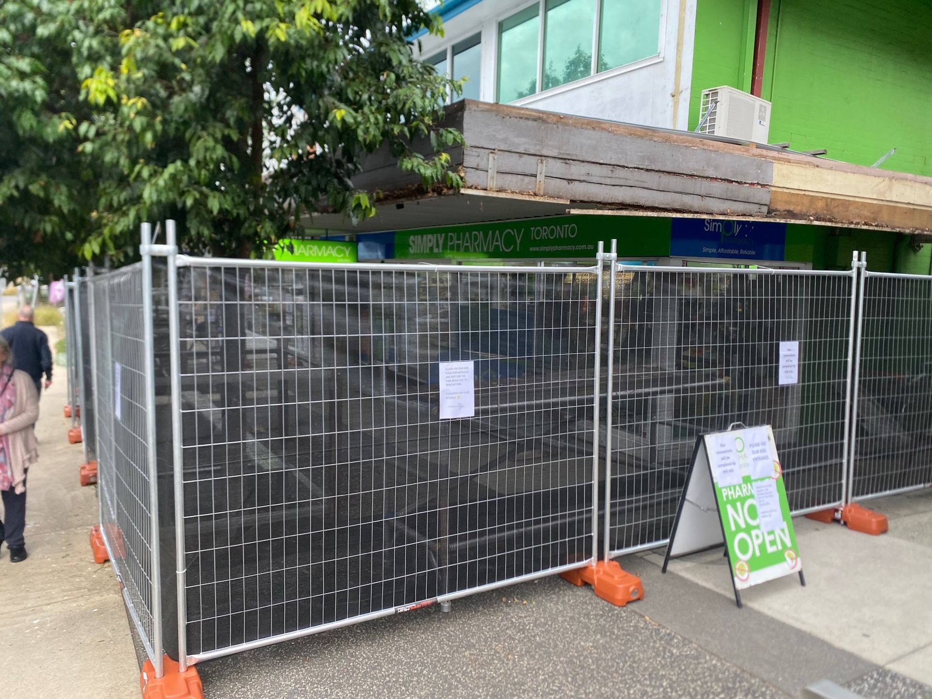 Construction Fencing Around a Building Entrance — Lakecrest Projects in Belmont North, NSW