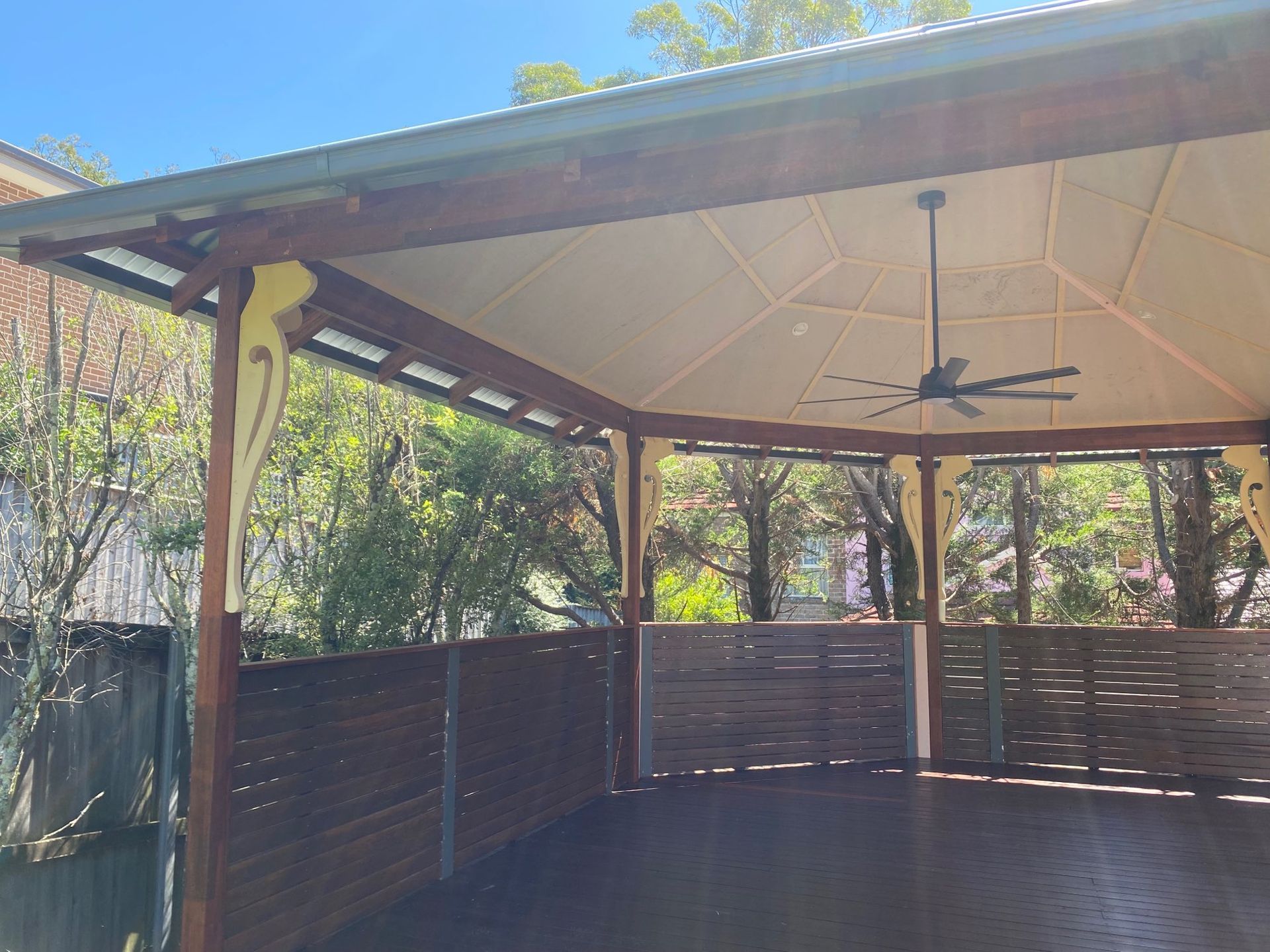 Covered Pavilion With a Ceiling Fan and Slatted Railing — Lakecrest Projects in Belmont North, NSW