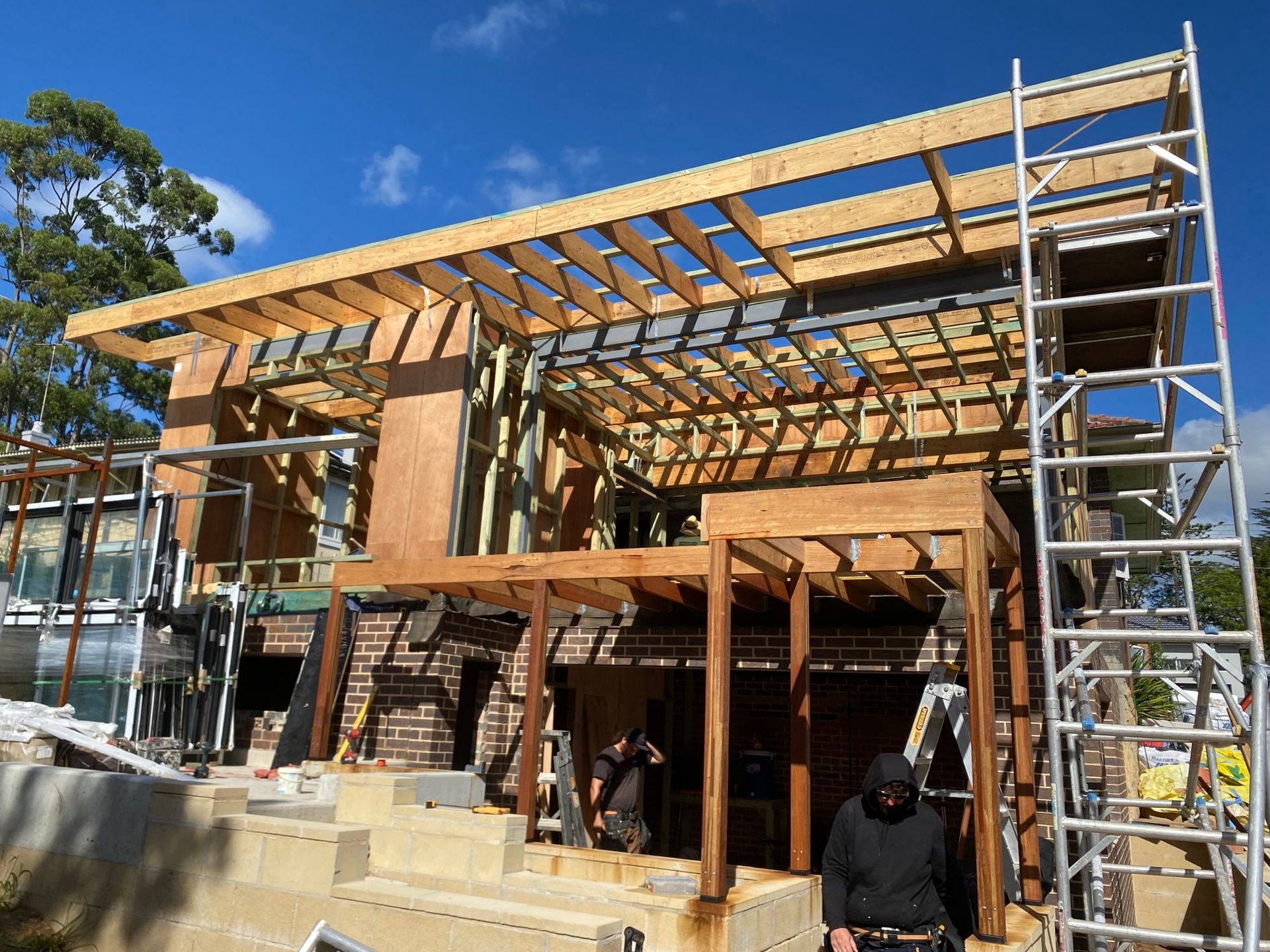 Partially Built House With Exposed Wooden Framing — Lakecrest Projects in Lake Macquarie, NSW