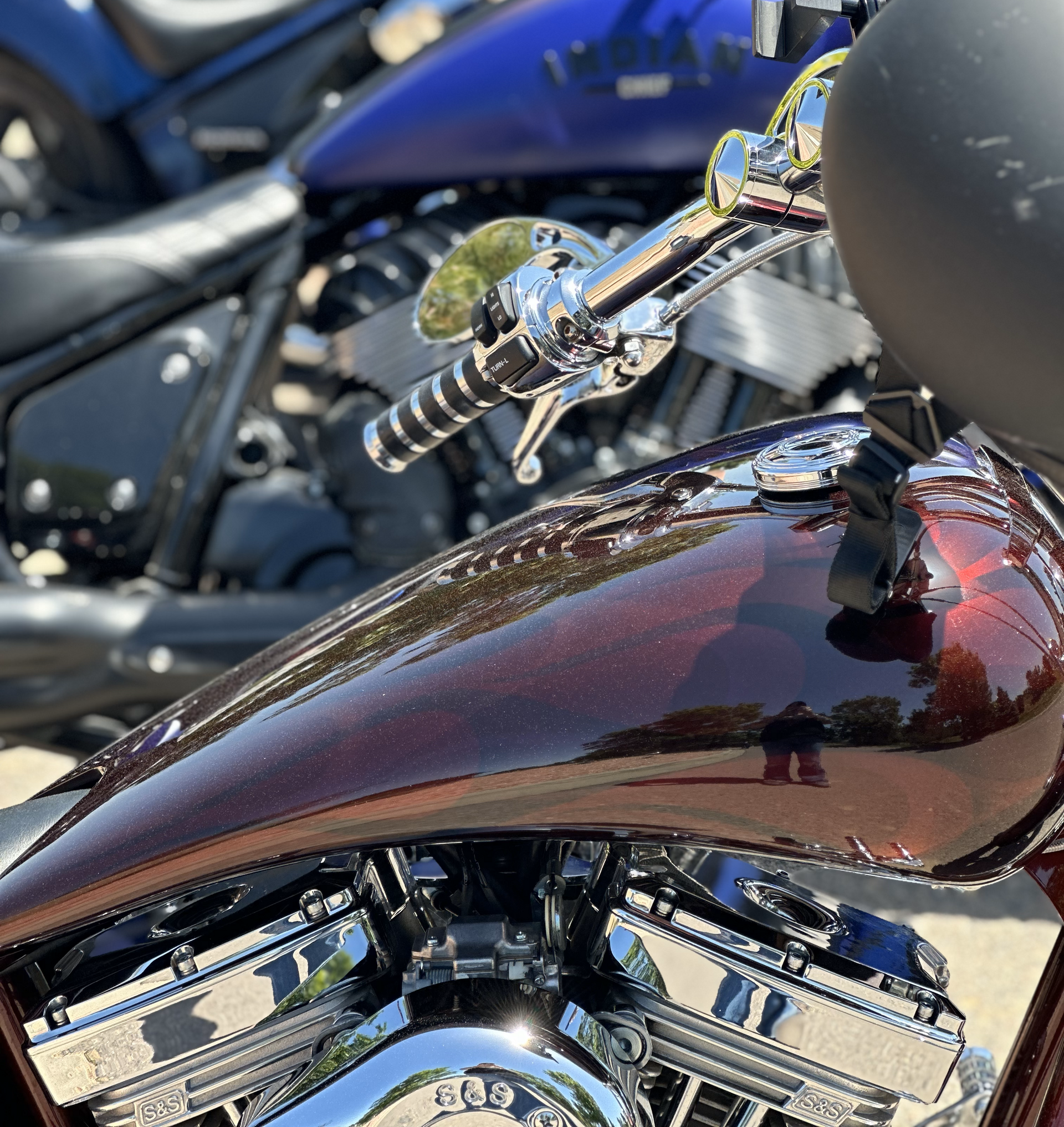 A close up of a motorcycle with a helmet on it