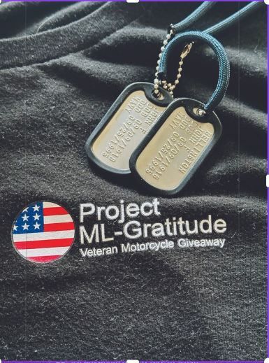 A black shirt that says project ml-gratitude on it