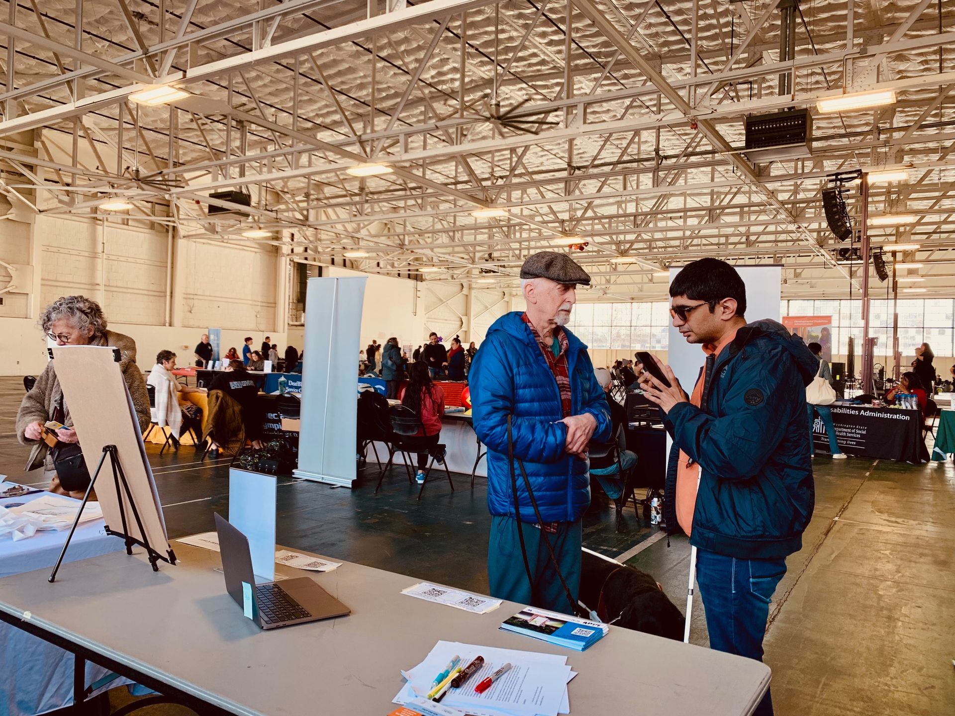 Kunal Mehta from The Taskar Center for Accessible Technology (TCAT) demonstrates AccessMap for Jeff Abrams, an advisor for Find a Ride.