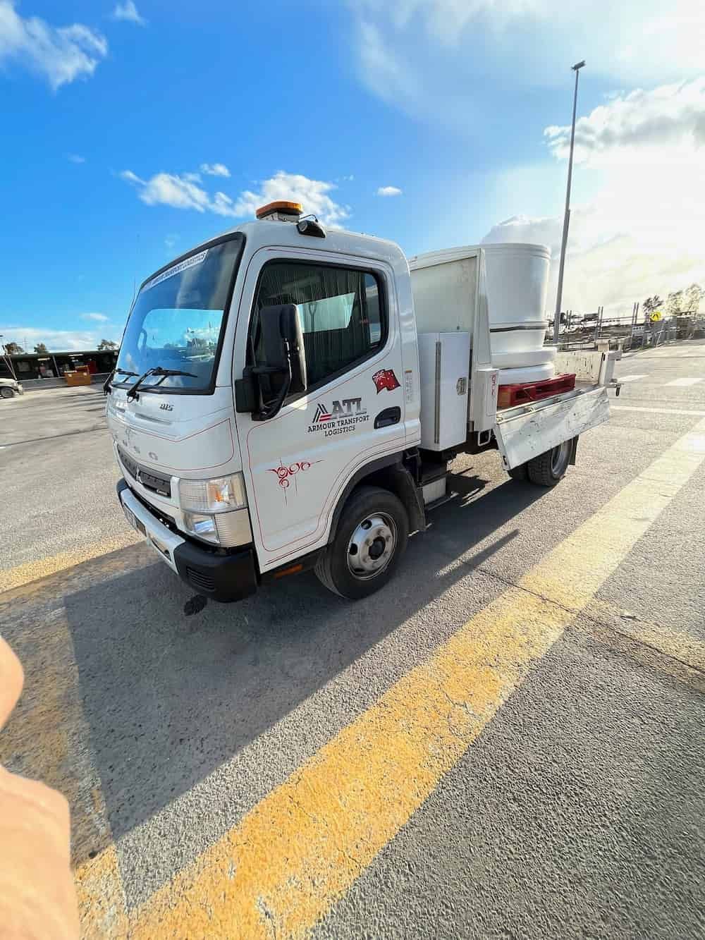 A White Truck Is Parked In A Parking Lot — Armour Transport Logistics In Melbourne, VIC