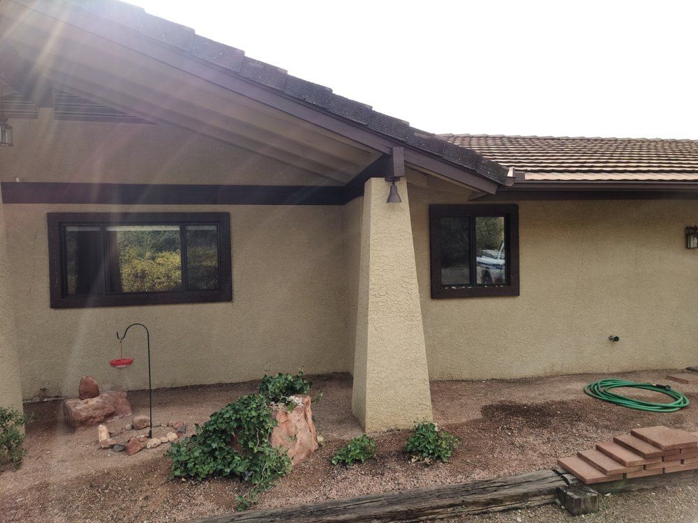 A house with a hose in front of it