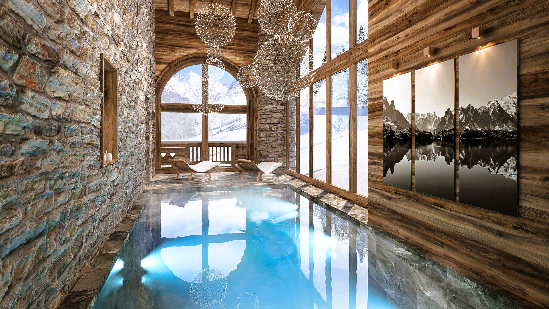 Indoor pool with mountain view, wood paneling, and crystal chandelier.