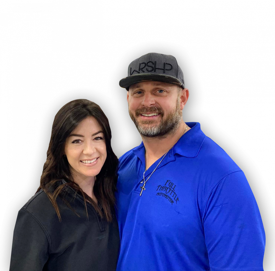 A man and a woman are posing for a picture | Full Throttle Automotive Llc