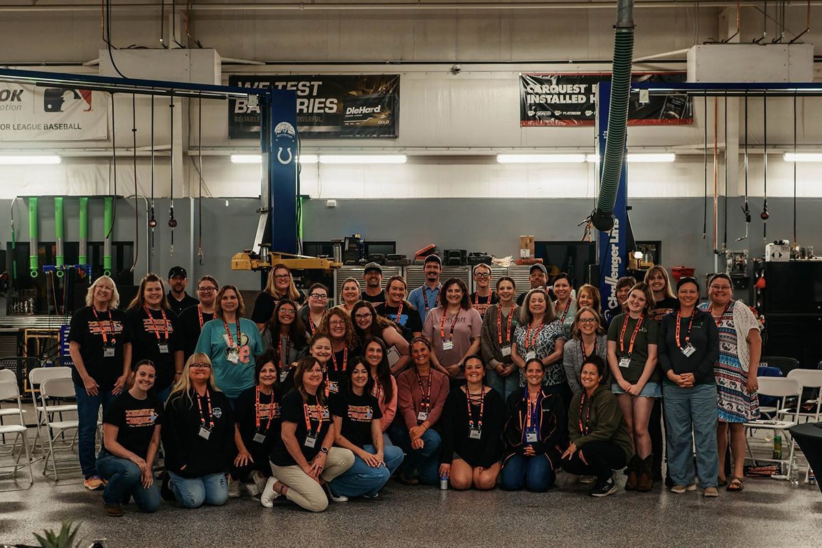 Group of women posed together for a photo for Ladies Night 2025 | Full Throttle Automotive LLC