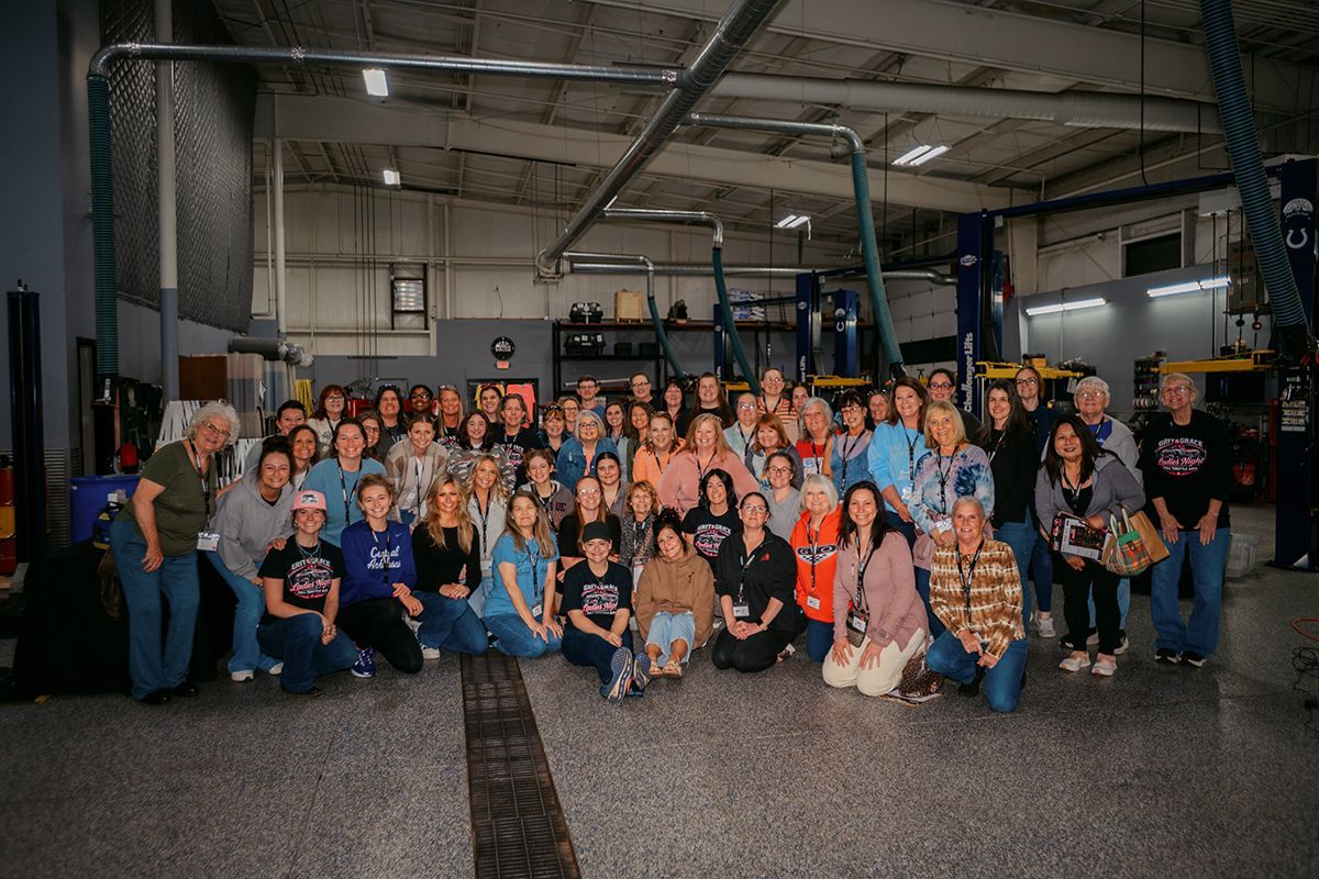 Group of ladies posing for a photo for Ladies Night | Full Throttle Automotive LLC