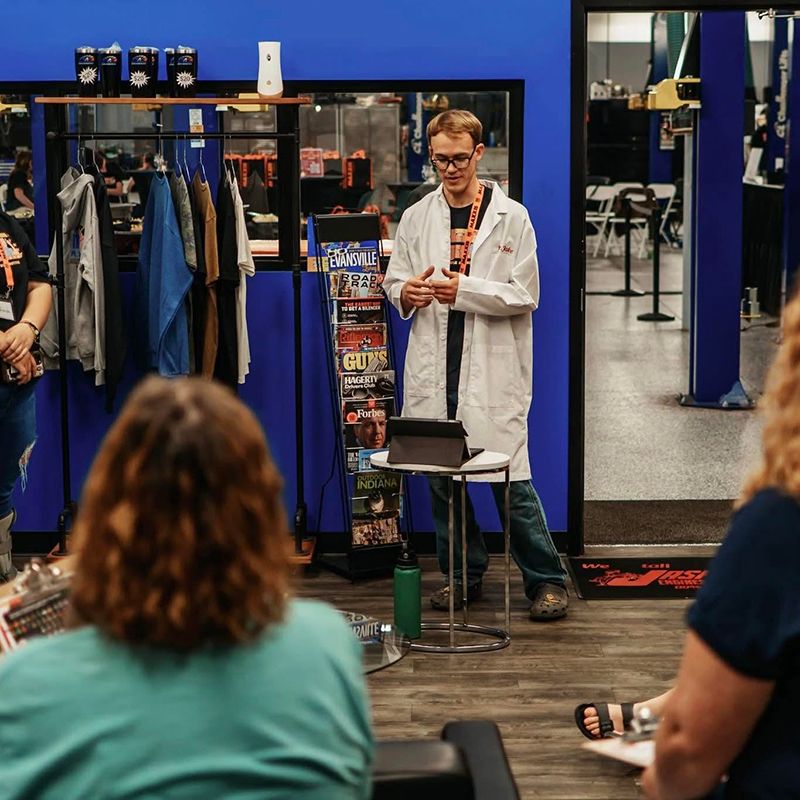 Technician teaching and explaining from iPad | Full Throttle Automotive LLC
