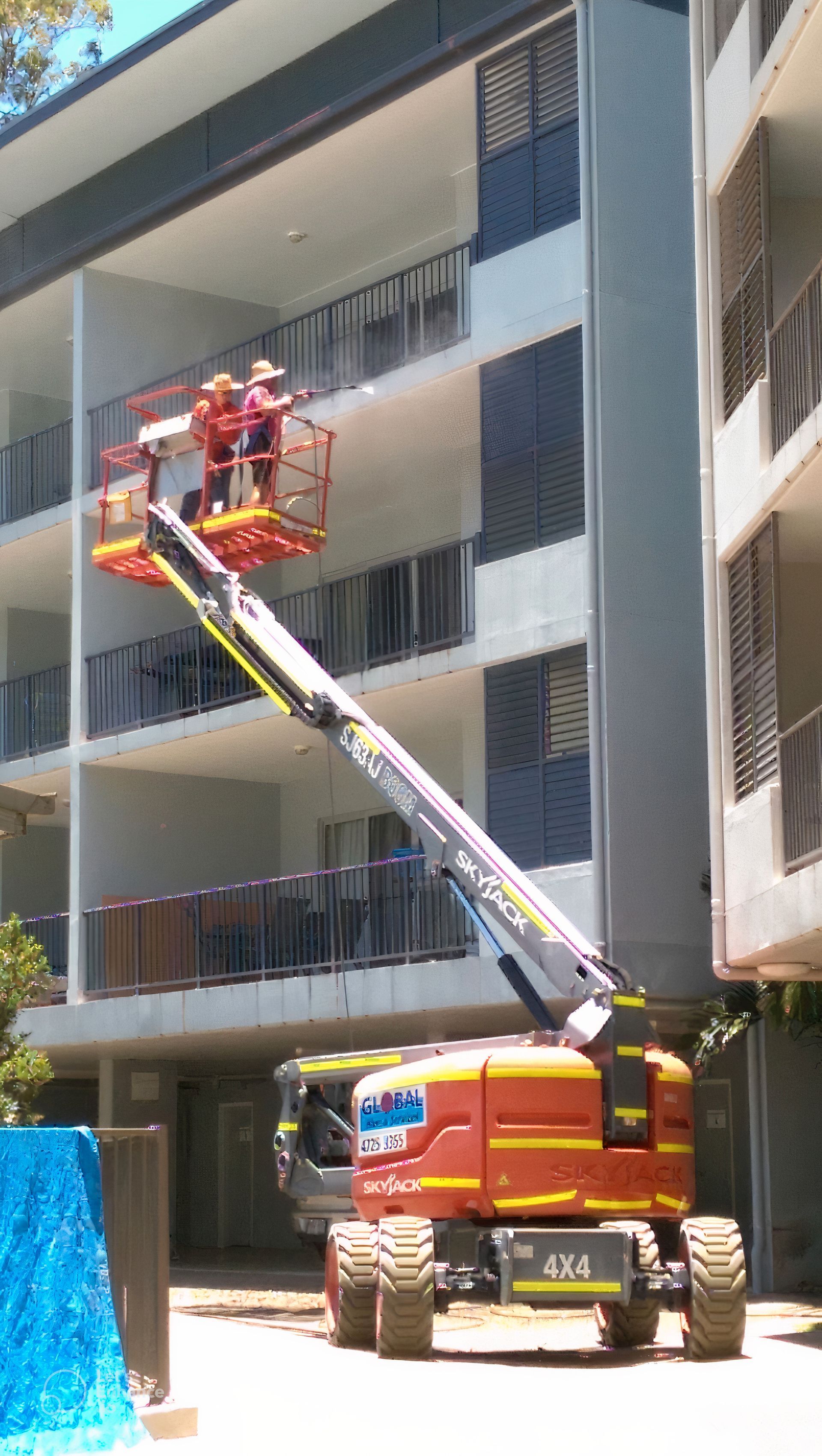 A Man is Cleaning a Marble Floor With a Machine — Blast H2O In Proserpine, QLD