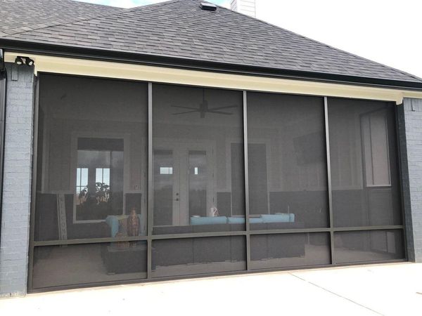 Screened-in backyard patio porch