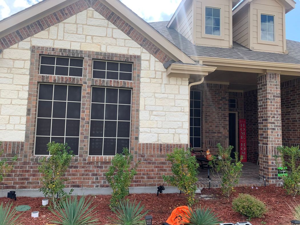 Brick house with stone siding