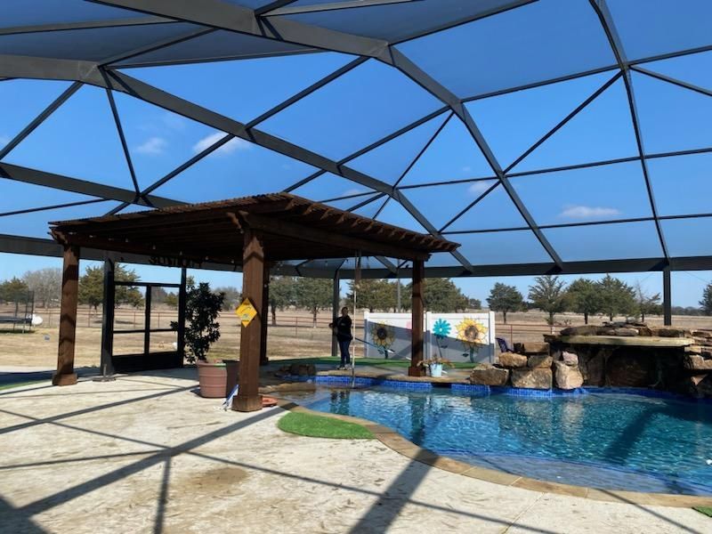 Pool inside screened enclosure
