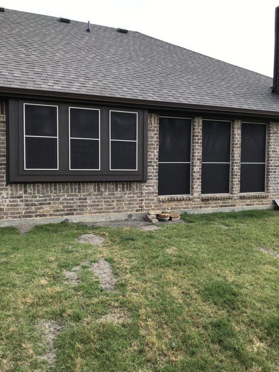 Brick house with solar screens