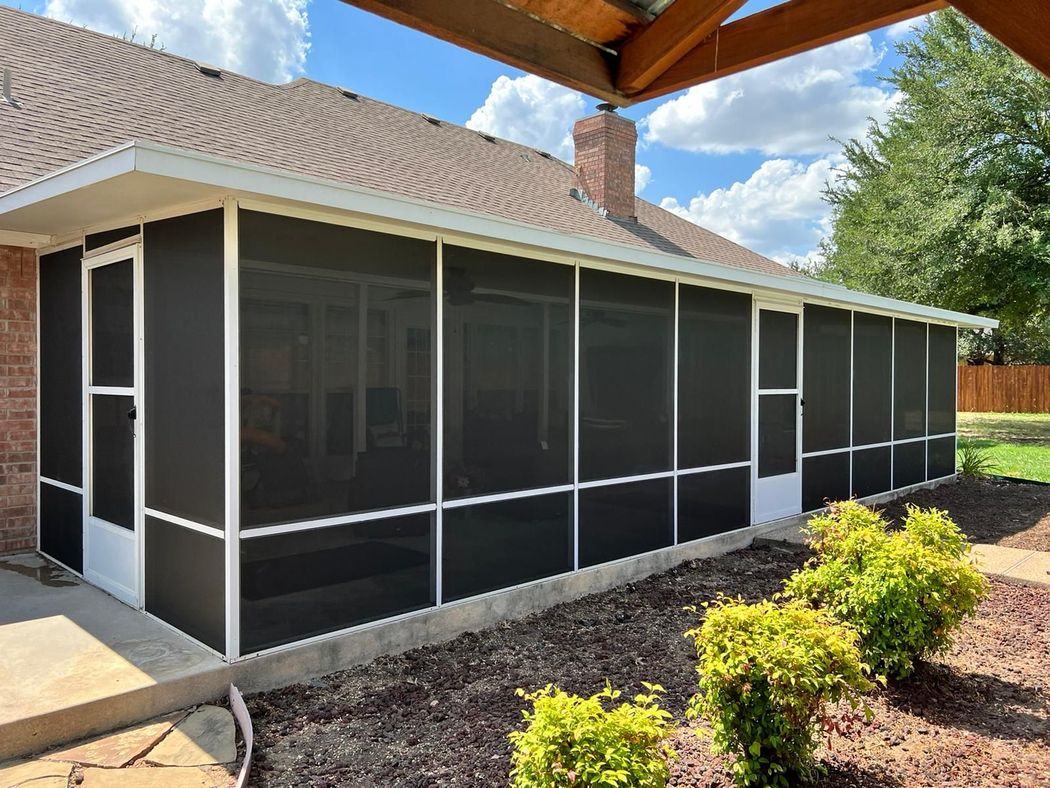Screened-in patio on a house