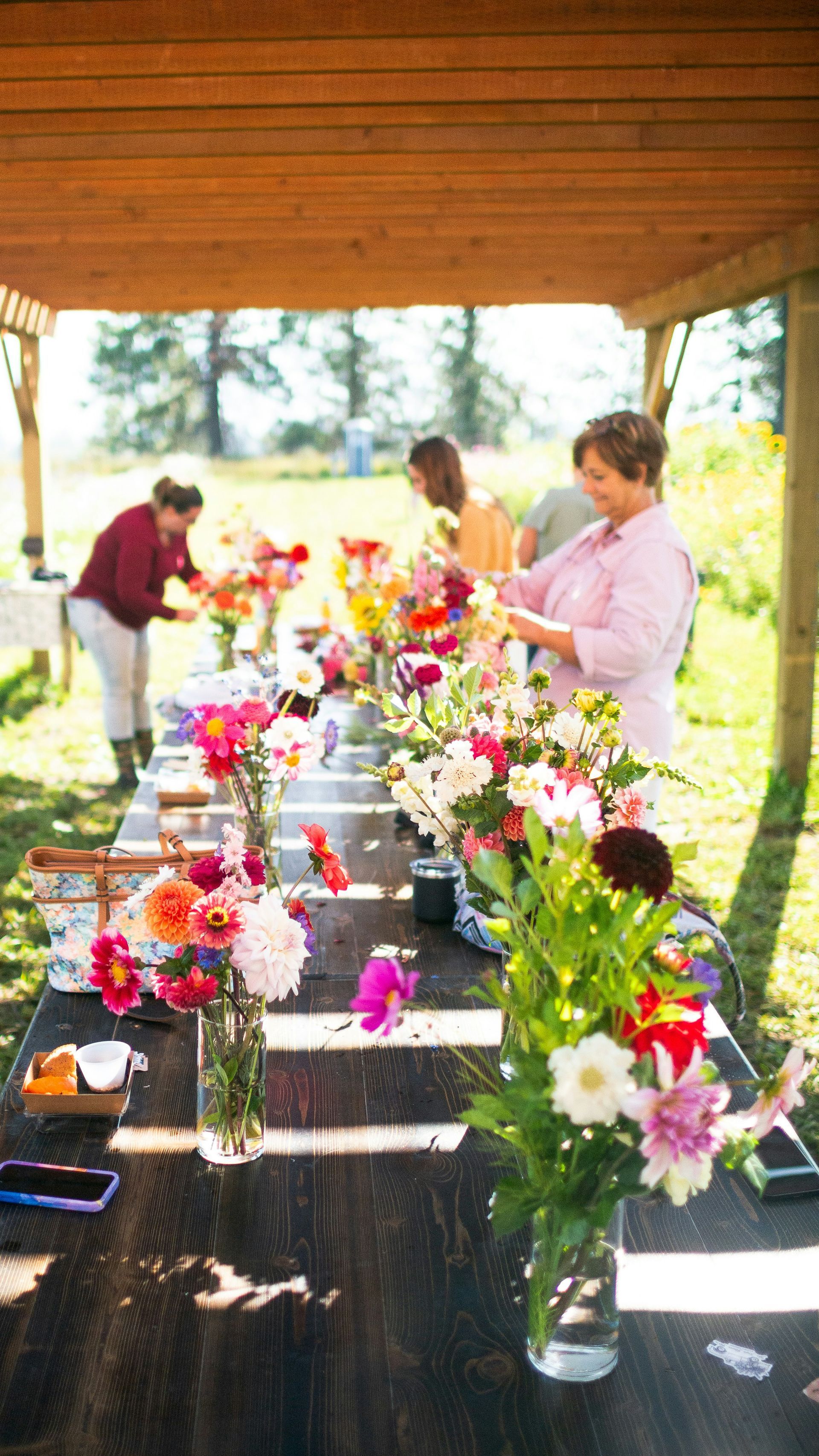 people and flower arrangements