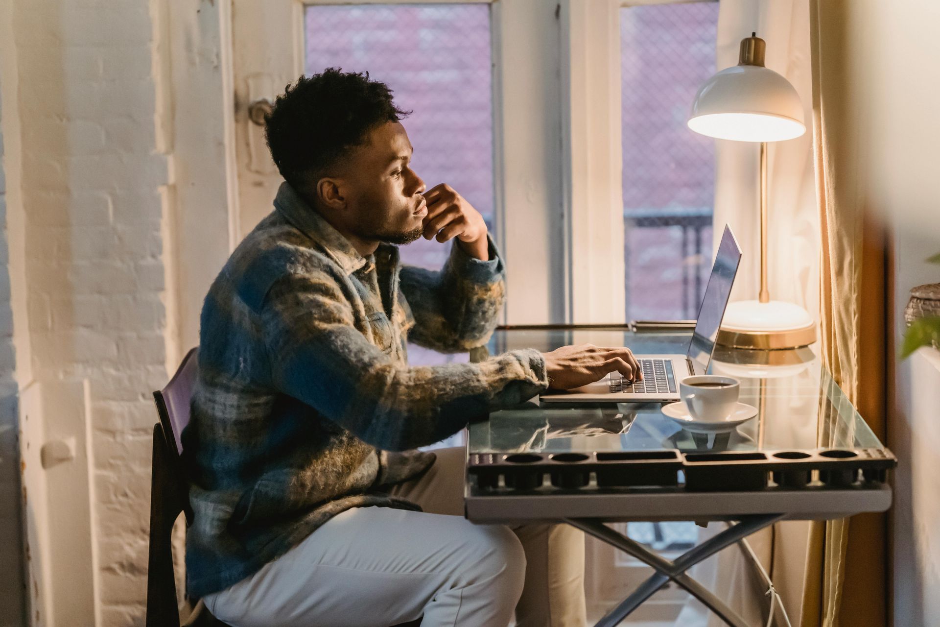 young adult at computer
