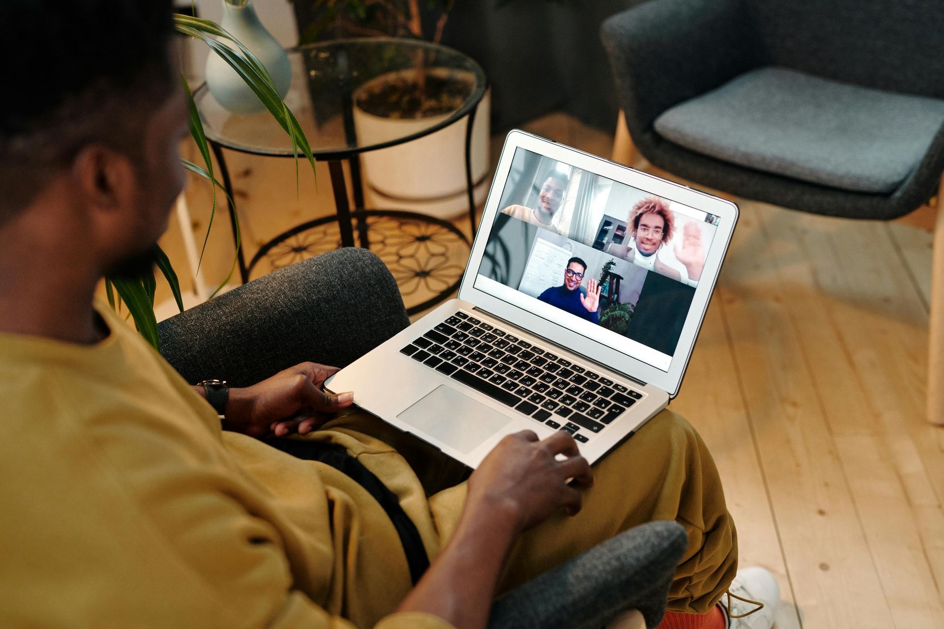 Person on laptop webcasting a webinar