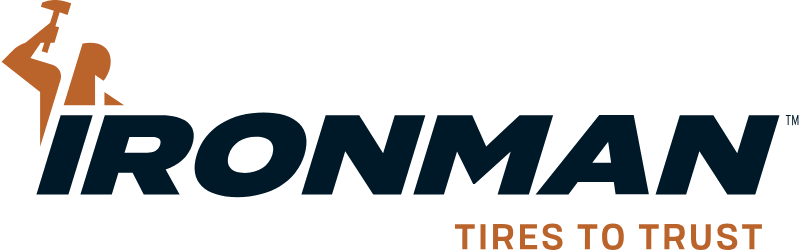 IRONMAN logo with orange tire graphic and slogan “TIRES TO TRUST”