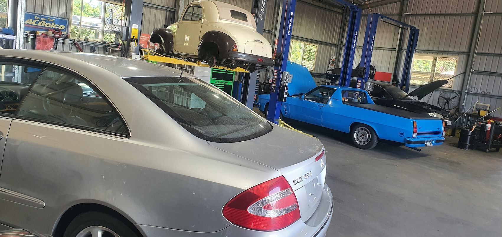 A group of Light Vehicles in the Workshop — H.M. Mechanical in Drayton, QLD