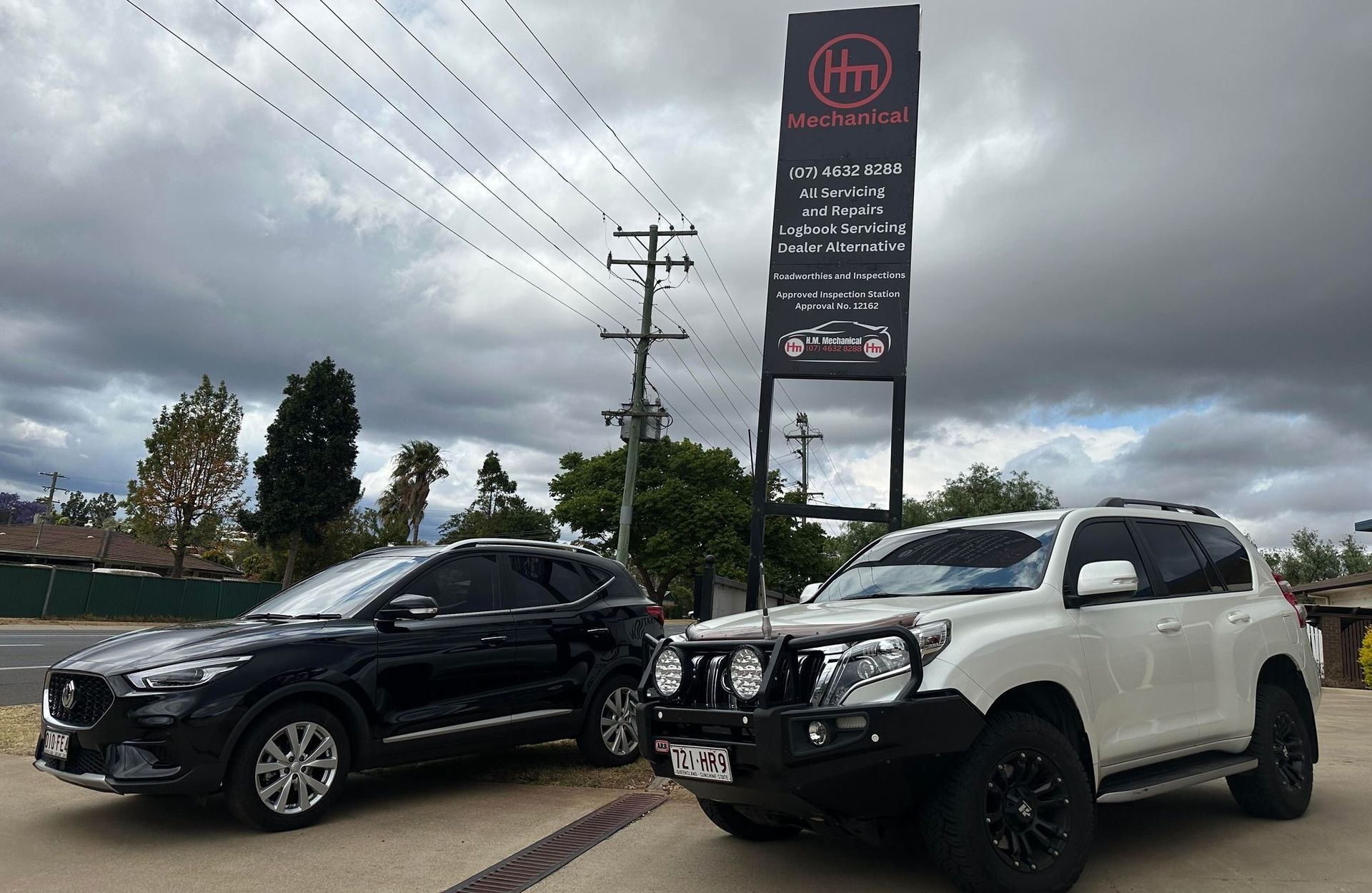 Prados Outside With Our Sign — H.M. Mechanical in Drayton, QLD 