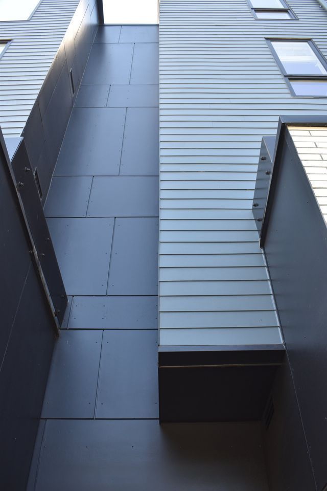 A building with a staircase leading up to the top of it.