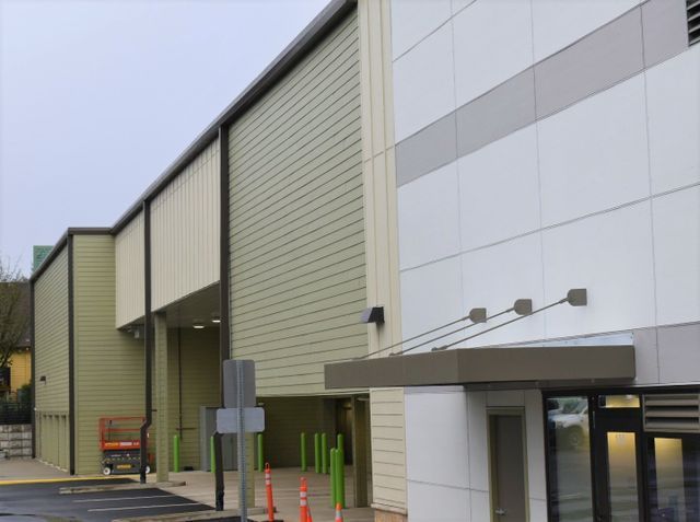 A building with a canopy on the side of it