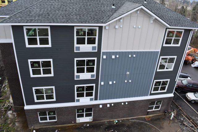 An aerial view of a building with a lot of windows
