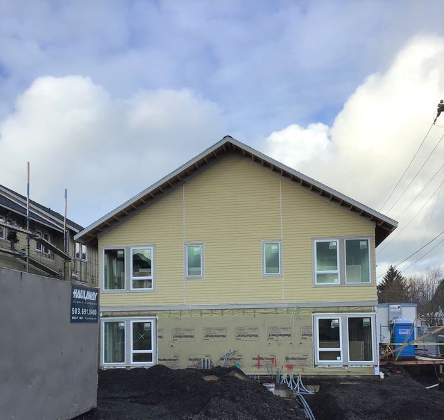 A house under construction with a sign that says ' mercury ' on it