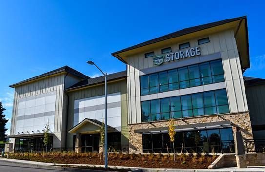 A large building with a lot of windows and the word storage on it.