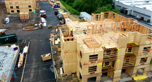 An aerial view of a building under construction.