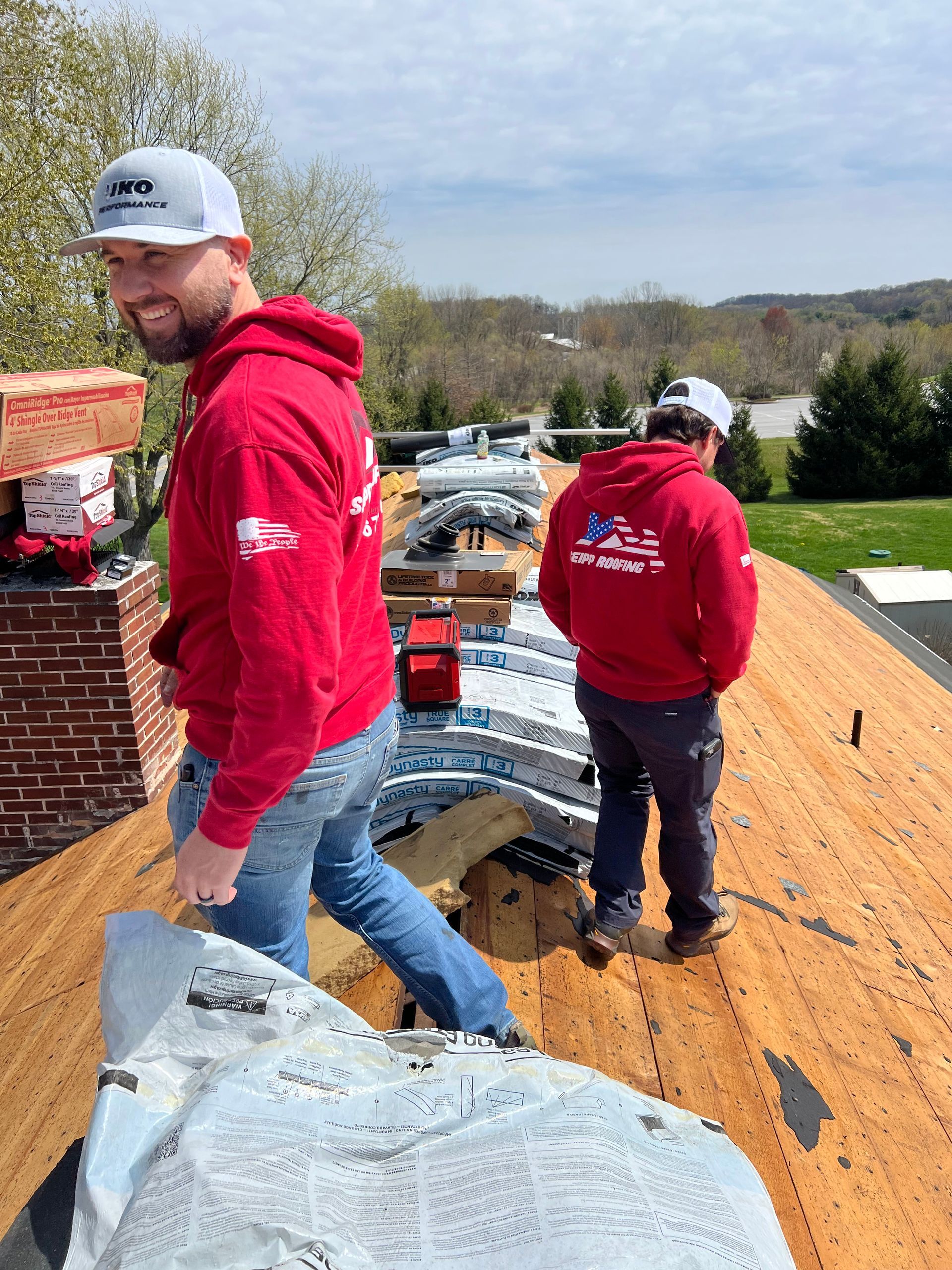 Tyler Seipp on a residential roof replacement job site during installation.