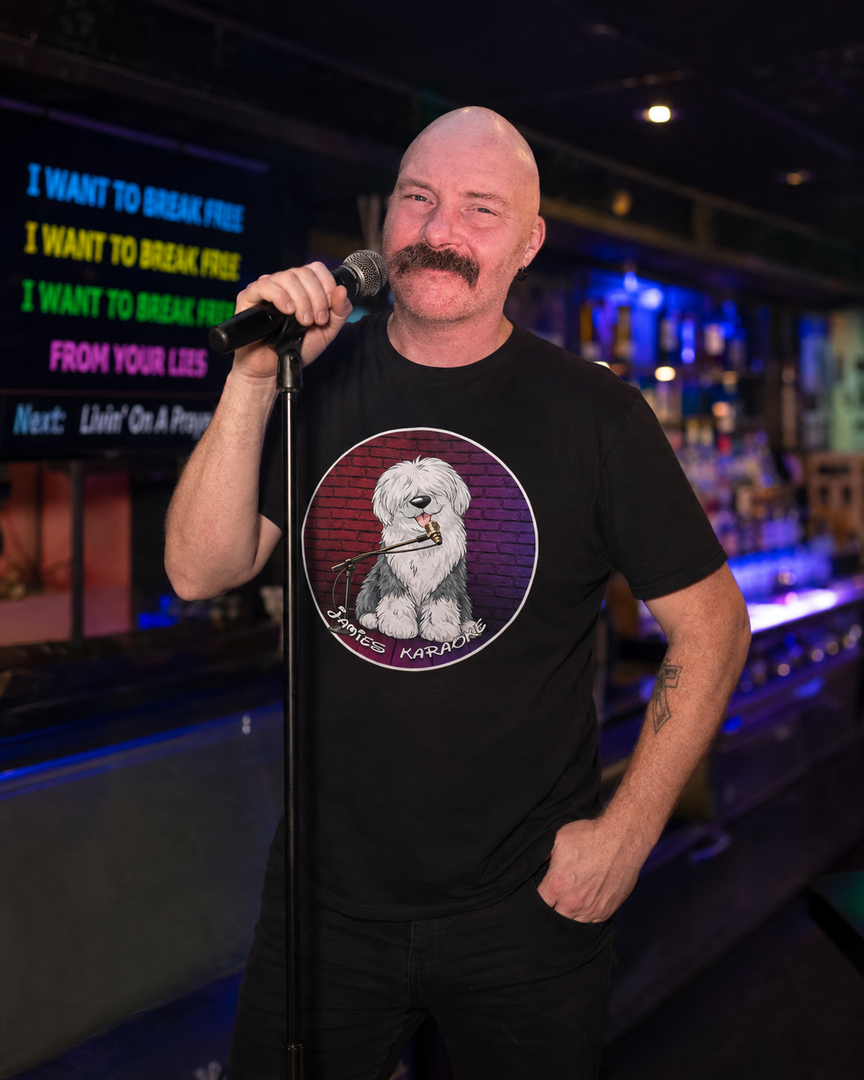 Jamie Wake hosting a karaoke night in a British pub, engaging with the crowd