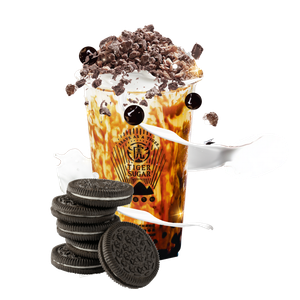 Brown sugar milk tea with cream, chocolate crumble, and Oreo cookies.