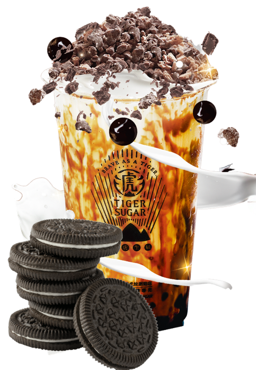 Tiger Sugar drink with brown sugar stripes, whipped cream, crushed Oreos, and boba. Stack of Oreos on left.