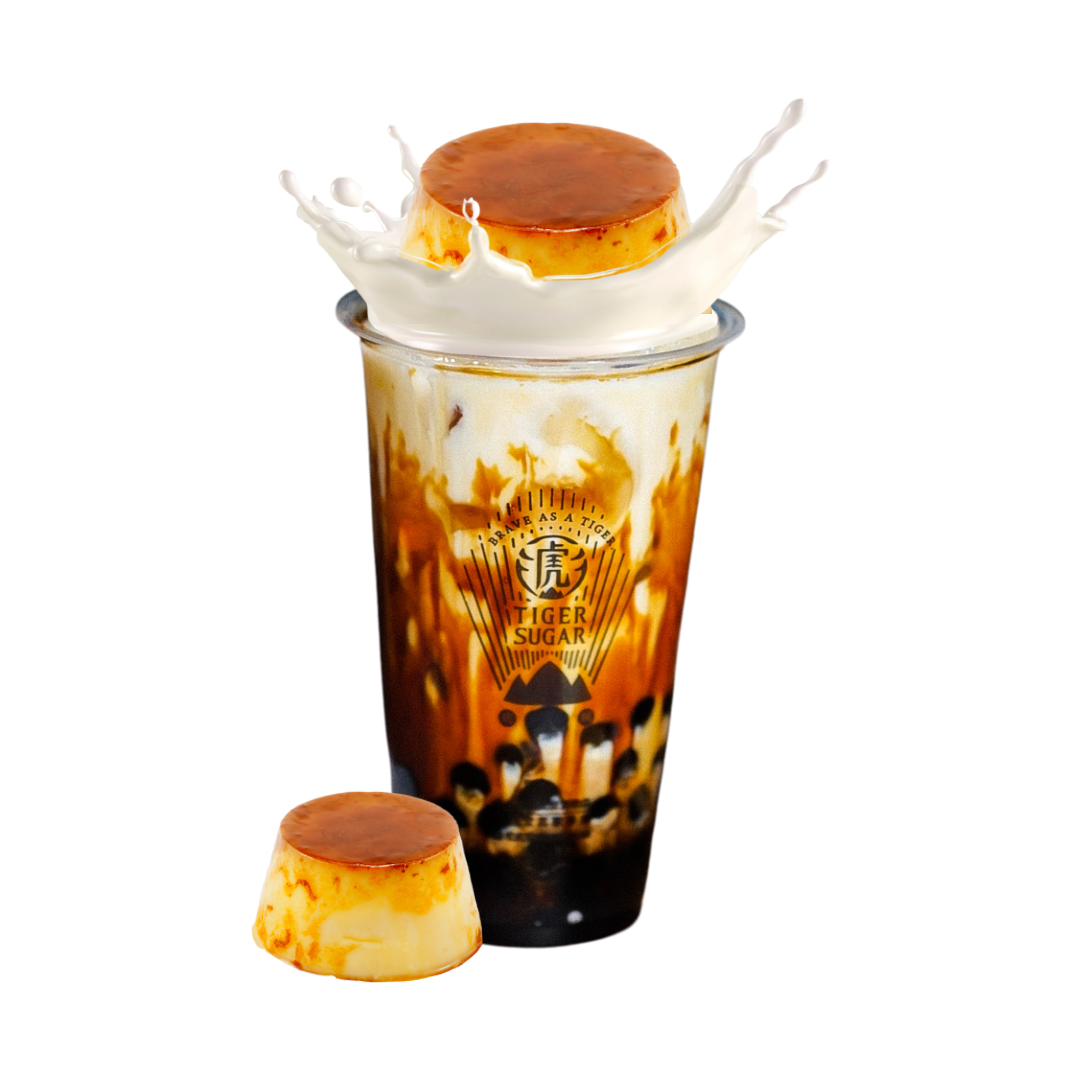 Tiger Sugar drink with flan topping and brown sugar pearls; white splash.
