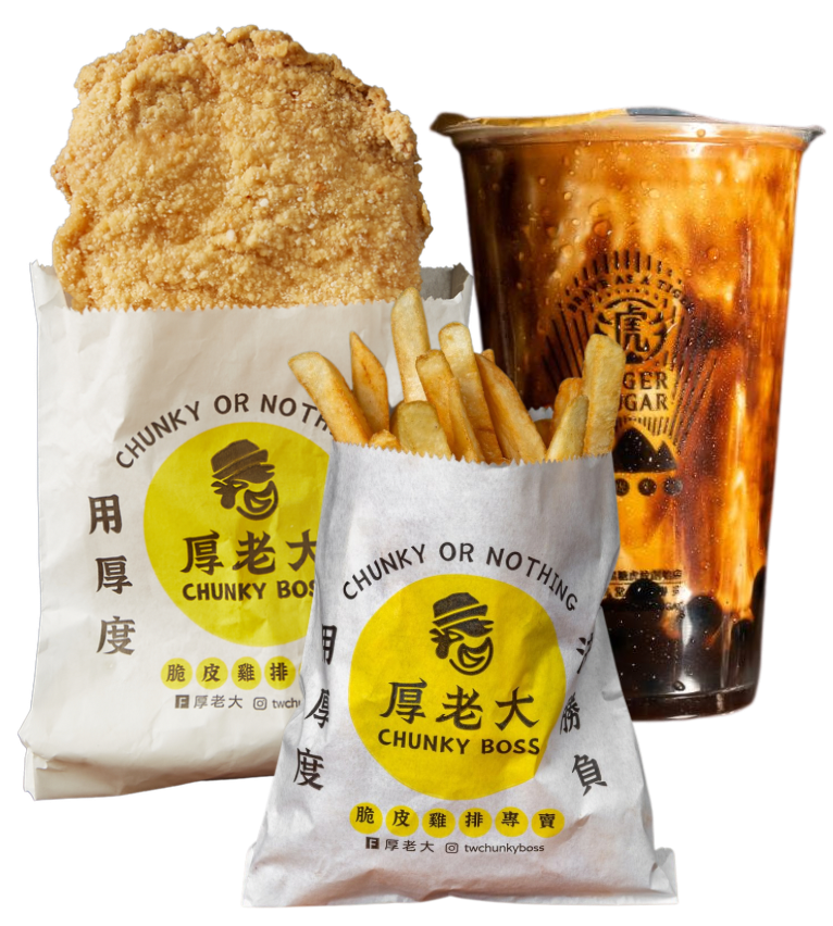 Fried chicken, fries, and brown sugar boba drink from Chunky Boss. Food is in paper bags.