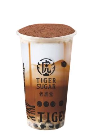 Tiger Sugar boba drink: layered brown sugar, milk, and tapioca pearls in a tall plastic cup.