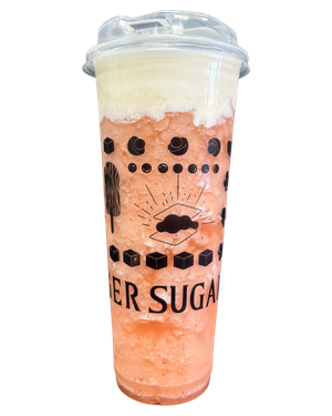 A tall plastic cup filled with a pink, layered drink topped with white foam and a clear lid.