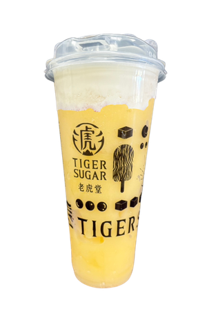 Tiger Sugar mango drink in a clear plastic cup. Yellow drink with white foam, black logo.