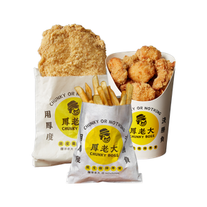 Fried chicken, nuggets, and fries in paper bags with Asian text and logo.