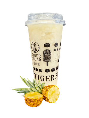Pineapple slushy in Tiger Sugar branded cup, pineapple slices below.