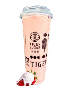Strawberry Tiger Sugar drink with a fresh strawberry and whipped cream.