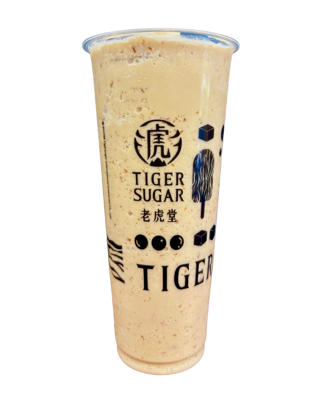 Tiger Sugar drink in a clear plastic cup. Beige blended beverage with logo.
