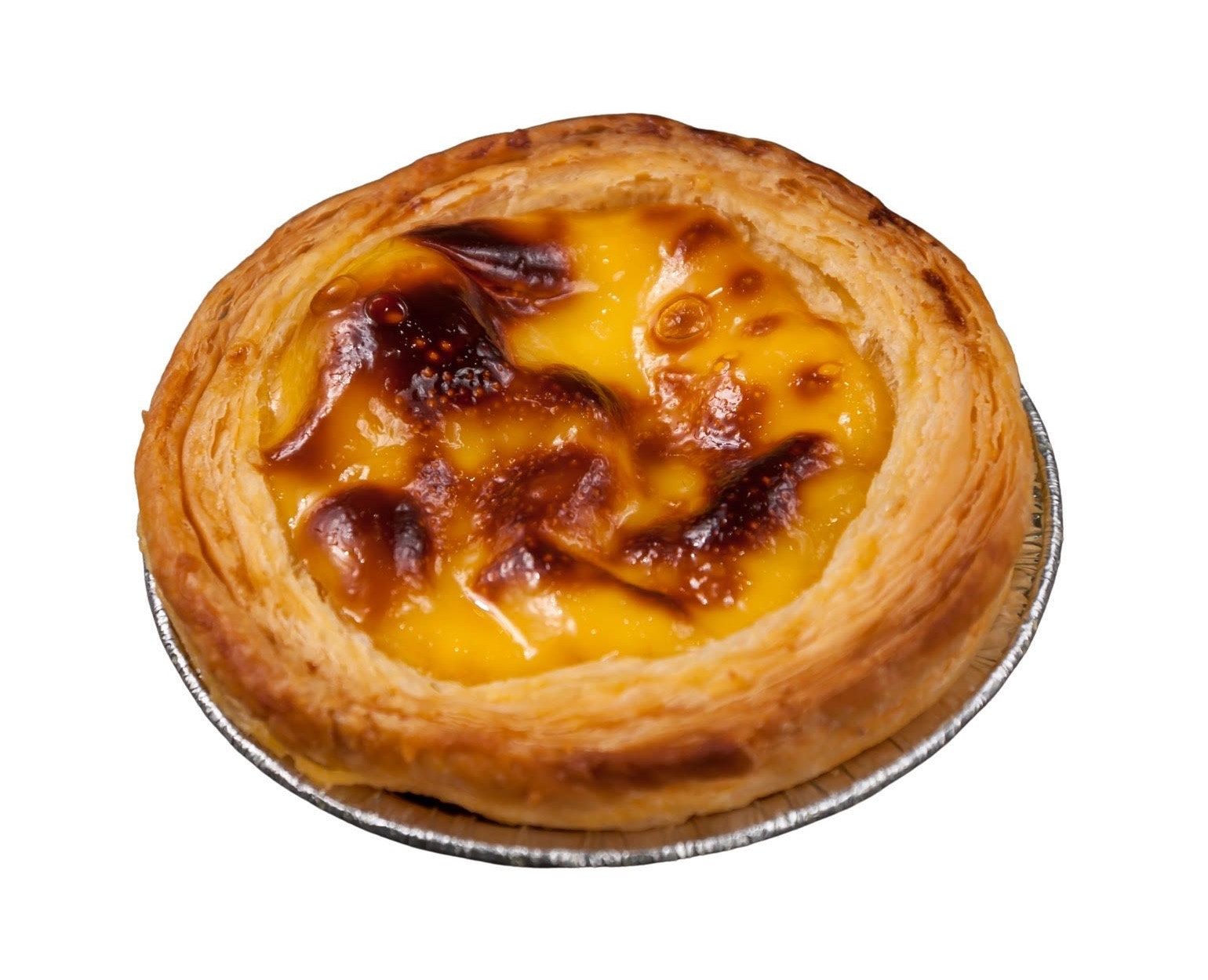 Pastel de nata pastry with caramelized custard filling in a flaky crust.