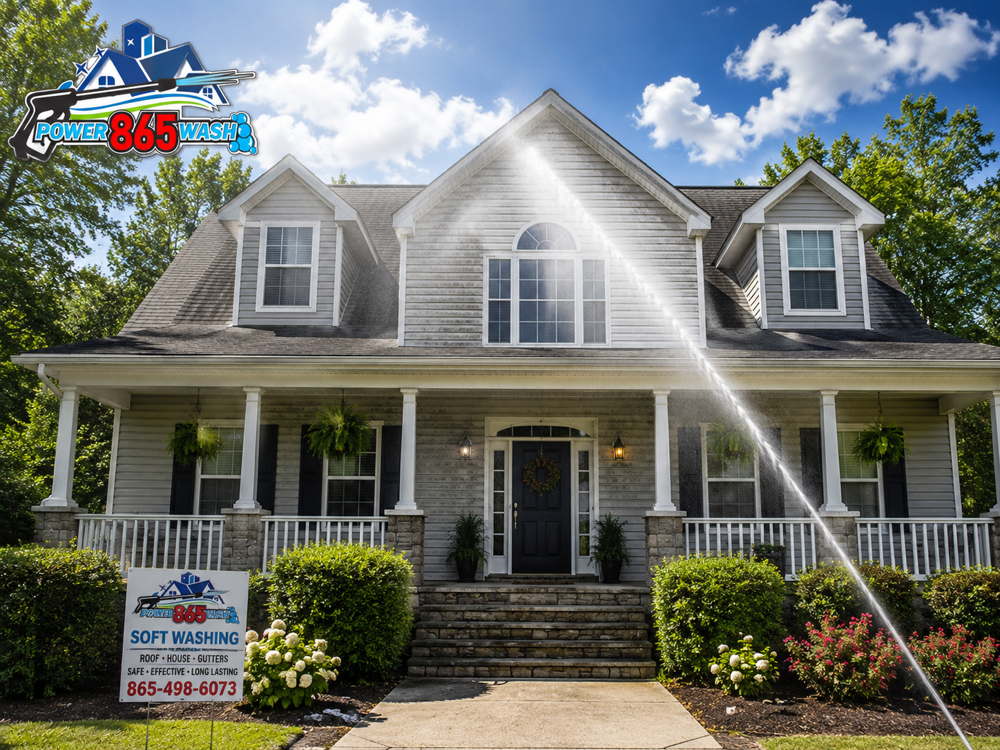 A person is spraying water on the roof of a house